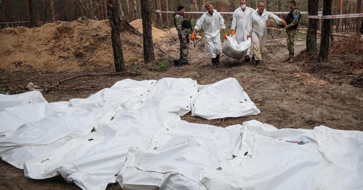 Family among hundreds of victims found in Ukraine mass grave